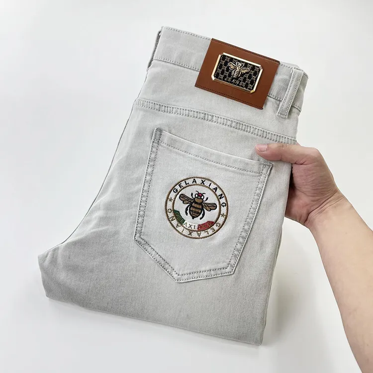 8806  夏季薄款牛仔裤男高品质修身小直筒男裤男士显高牛仔裤男