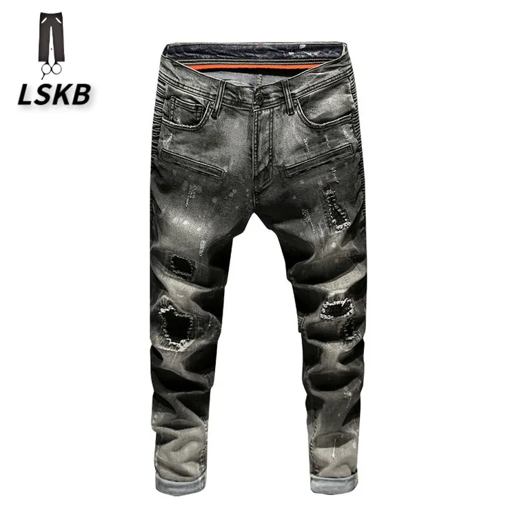 美式高端潮牌复古破洞牛仔裤男春秋修身小脚弹力泼墨补丁休闲长裤