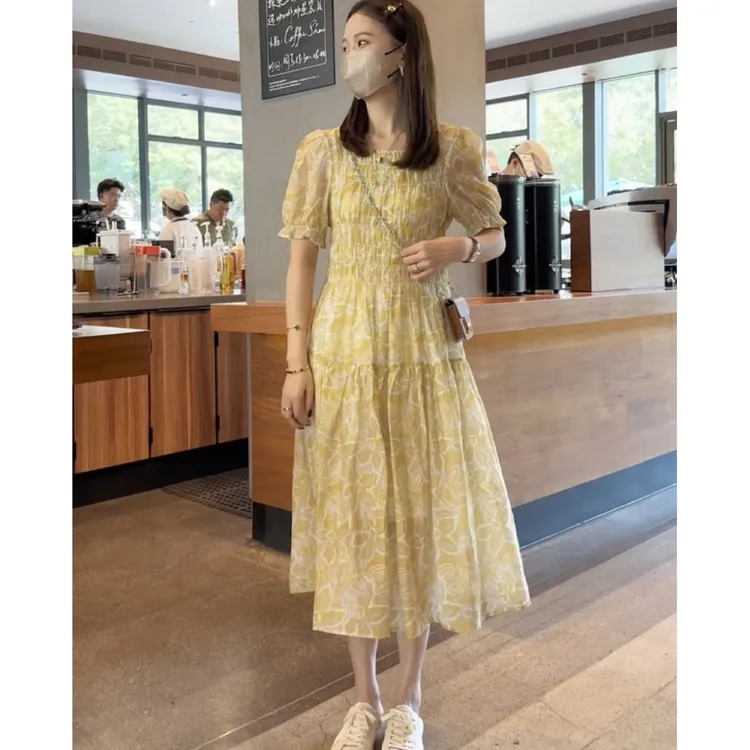 法式时尚泡泡袖黄色碎花连衣裙女2025夏季新款气质打揽显瘦中长裙