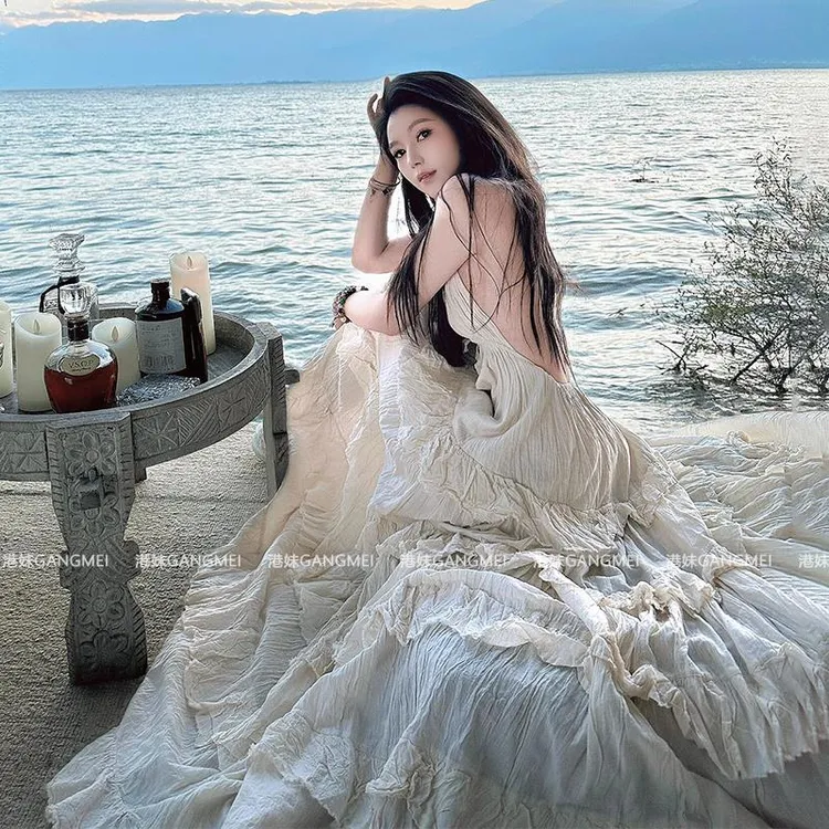 泰国云南海边度假棉麻领挂脖连衣裙仙女性感露背荷叶边蛋糕长裙