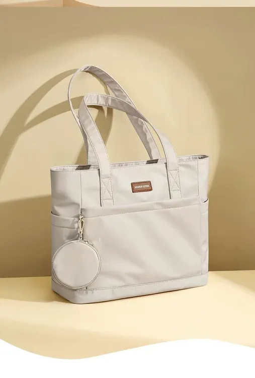 大容量托特包2025新款帆布手提网红大学生文艺百搭通勤尼龙斜挎包