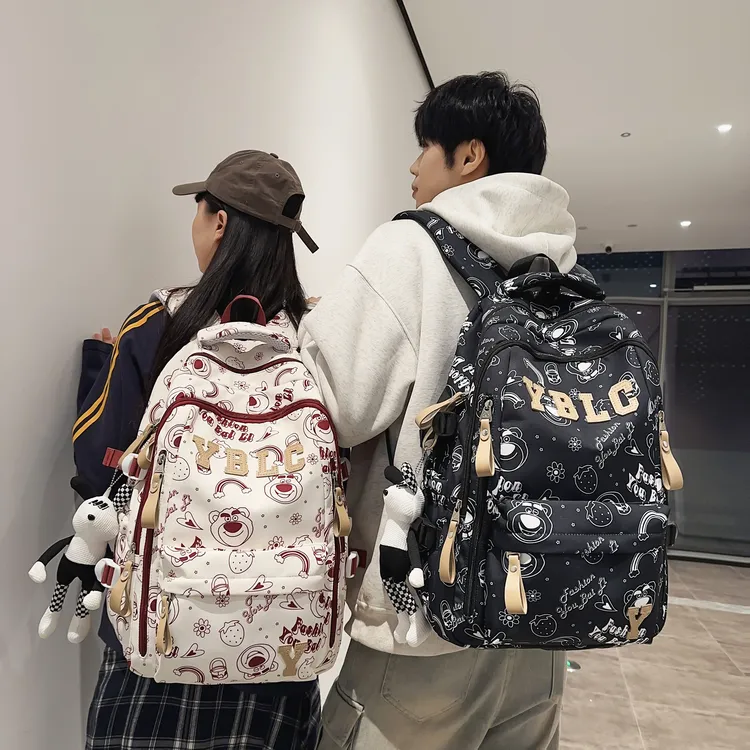 双肩包新款大容量多隔层草莓熊涂鸦小学初中高中大学大容量书包