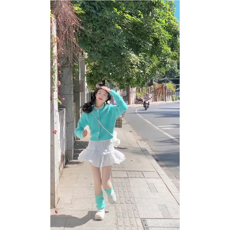 2025春夏绿色长袖针织开衫女春季减龄宽松短款毛衣外套半身裙套装