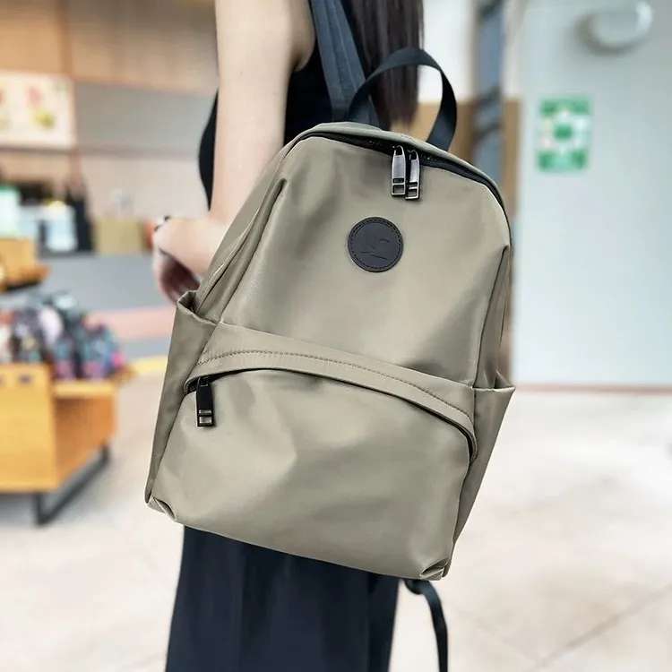 防水登山包工装风纯色双根双肩包休闲时尚百搭轻便潮流大学生风