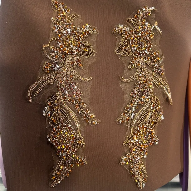 手工钉珠《咖啡色》بالىزانىڭ رەختى  كافى رەڭ