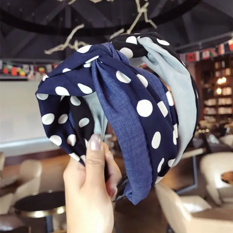 韩式简单面料圆点对比色发带，中间打结，覆古发孔十字弓宽边发带