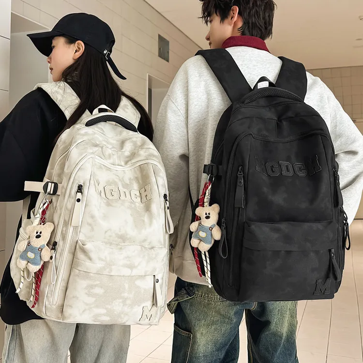 上新减负护脊大容量扎染双肩包女初高中大学生书包旅行包潮酷时尚