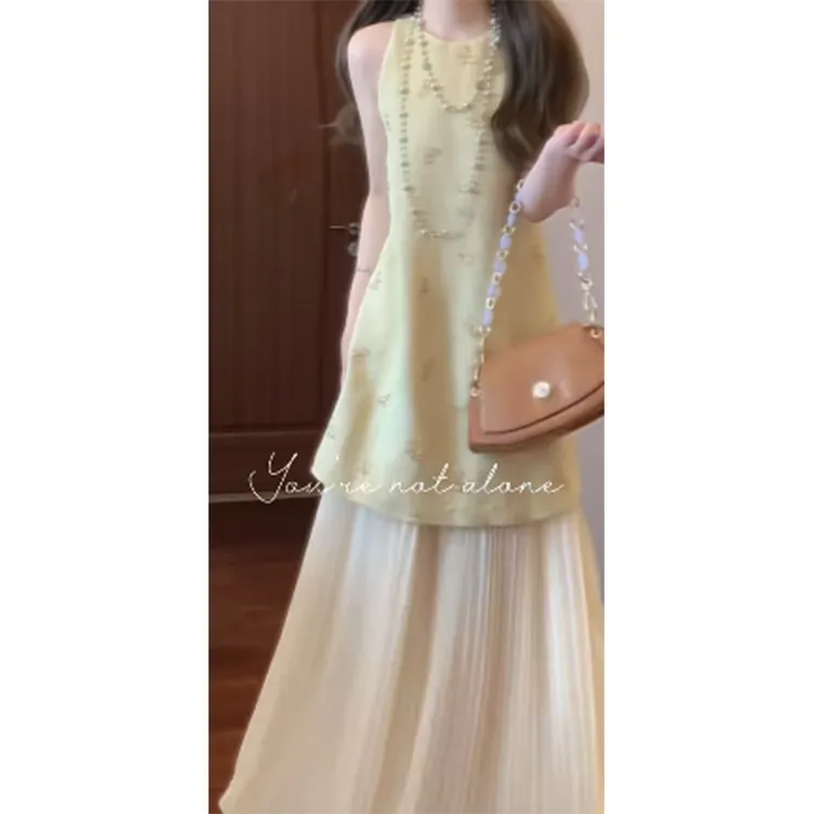 法式温柔气质名媛黄色无袖背心连衣裙漂亮独特超好看收腰a字裙子