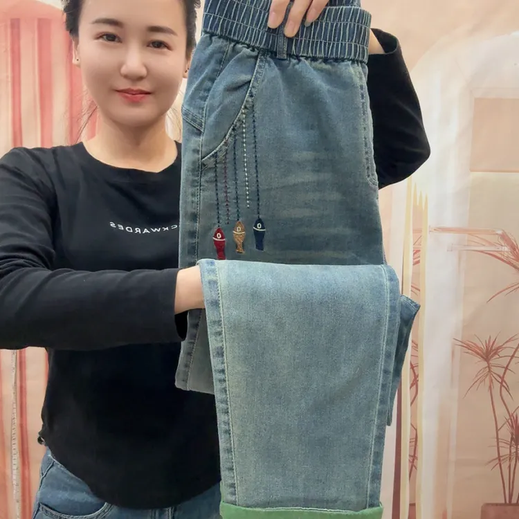 28006高腰弹力宽松显瘦哈伦牛仔裤时尚百搭适合多季穿着休闲秋季