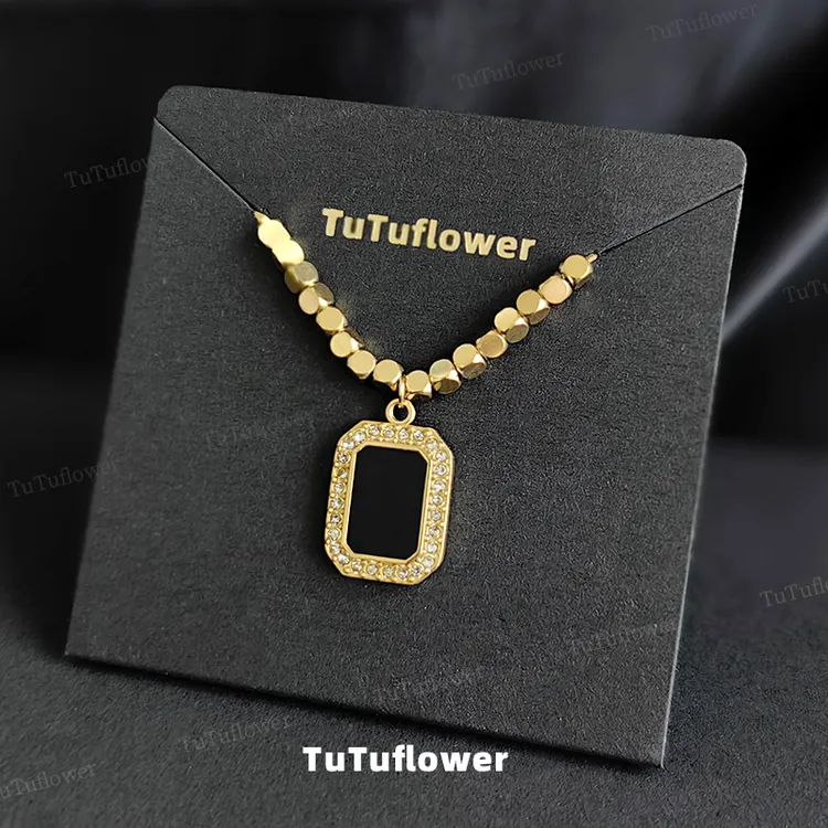 钛钢项链 新款吊坠小众设计轻奢锁骨链黑色几何毛衣链精致简约