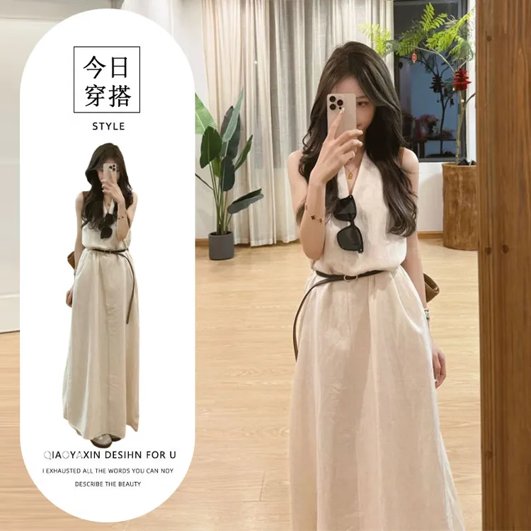 法式杏色V领挂脖无袖连衣裙女2025夏季新款漂亮独特松弛感长裙子