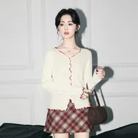 杏色木耳边针织开衫女春秋2025秋新款撞色V领镂空打底衫短款上衣