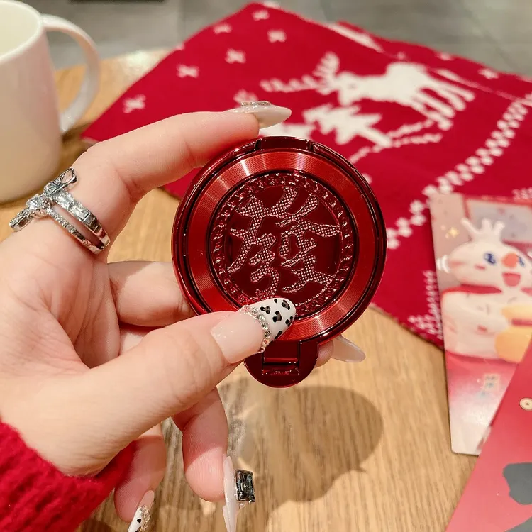 中国风新年款发财旋转陀螺适用手机支架黏贴式解压背贴手机壳懒人