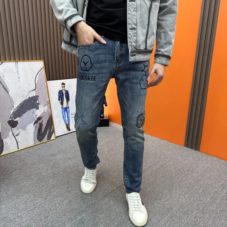 秋冬烫钻牛仔裤欧货潮牌时尚百搭水洗蓝弹力修身小脚潮流男士裤子
