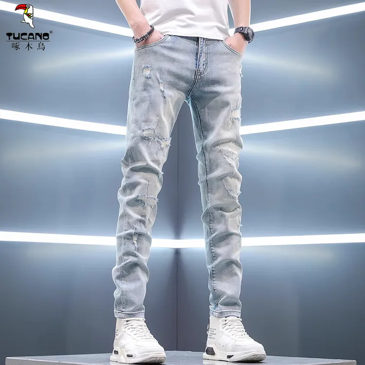 啄木鸟2025新款夏季薄款男士牛仔裤男浅色破洞潮牌修身小脚男款