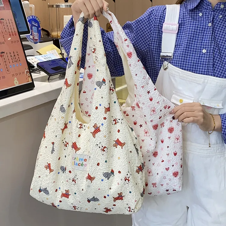 新款卡通压花帆布包袋女大容量背心包逛街购物袋学生书包