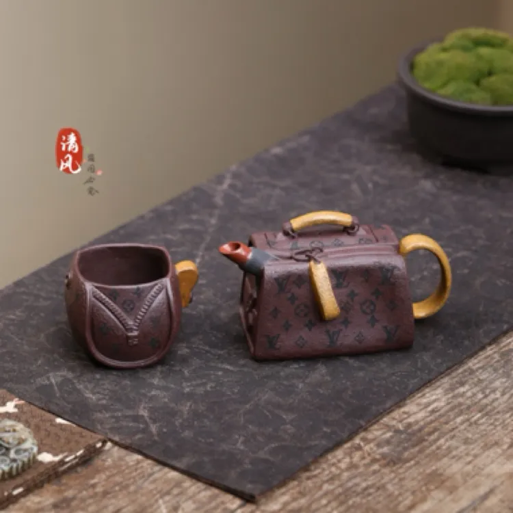 宜兴紫砂壶【一壶一杯】网红包包造型紫砂壶老紫泥220cc茶壶