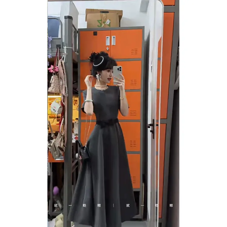 连衣裙女2025夏季新款法式气质前后两穿设计感收腰显瘦蝴蝶结裙子