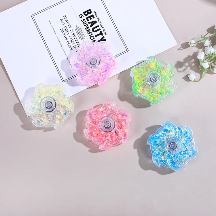 旋转流沙指尖陀螺创意高颜值解压玩具入油闪粉花瓣