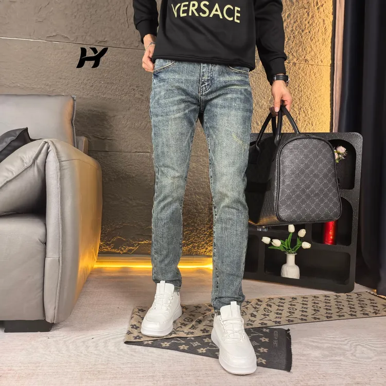 秋季破洞潮流修身小脚牛仔裤男2025轻奢时尚百搭男士牛仔裤休闲裤