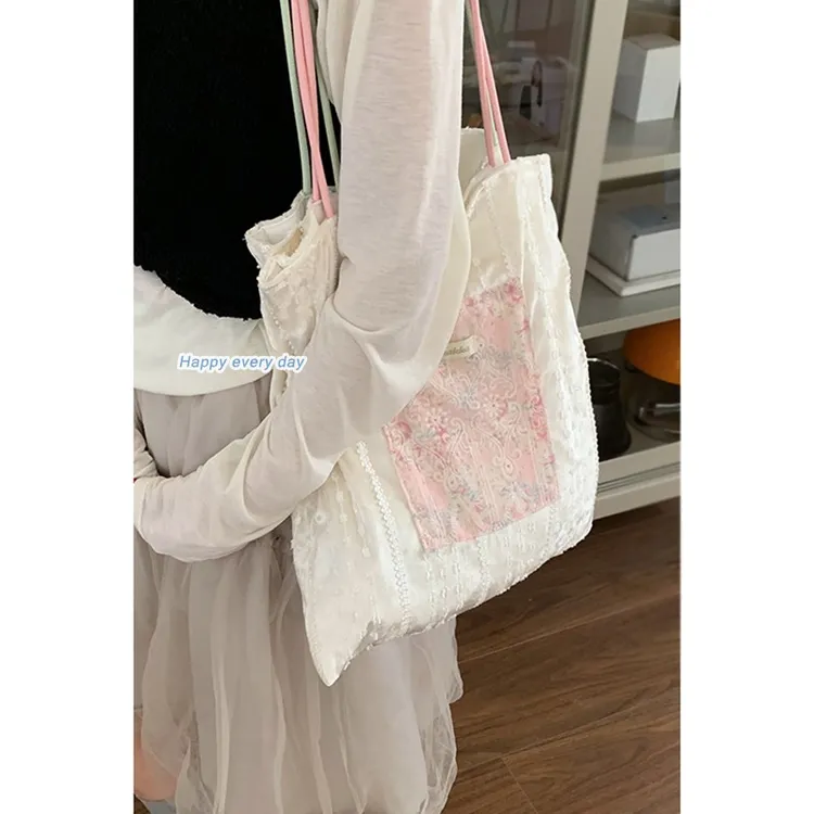 包包女款爆款2025新款春季提花刺绣帆布包大容量单肩包通勤托特包