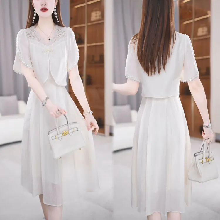 2025夏季新款气质优雅镂空短袖连衣裙时尚设计感收腰显瘦中长裙子
