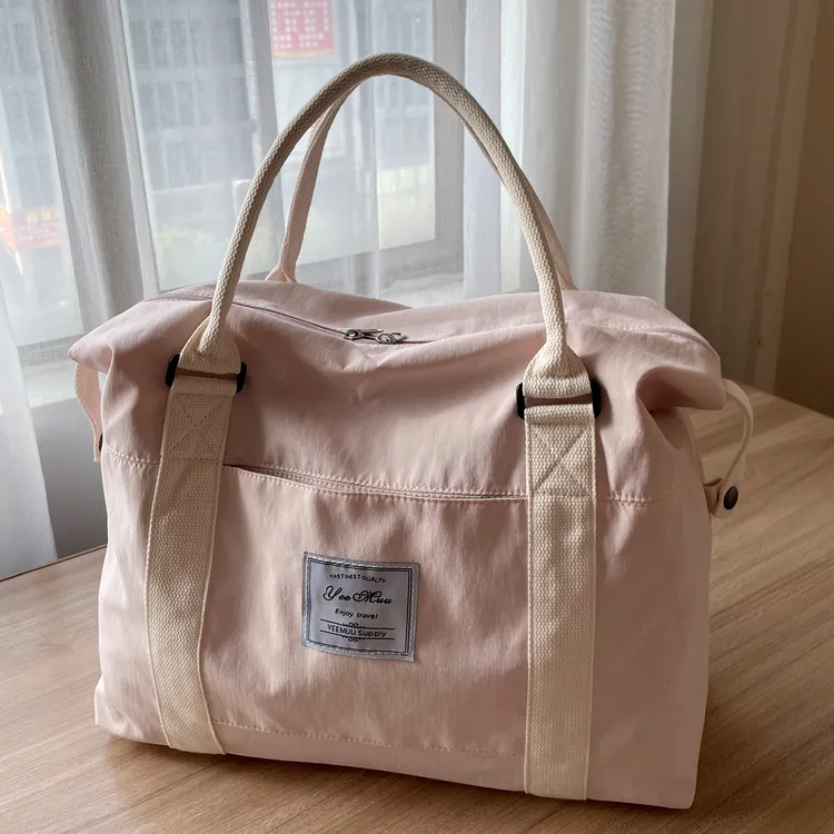 大容手提旅行包女入院待产包行李箱附加包出差通勤行李旅游大包