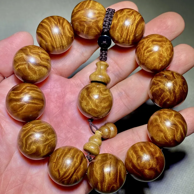 金丝楠木龙胆2.0阴沉木老料爆满水波纹男女盘玩文玩手串