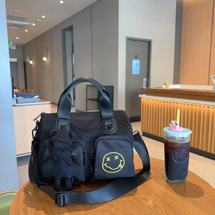 时尚女包新款网布手提包枕头包大容量单肩斜挎包多口袋公仔单肩包