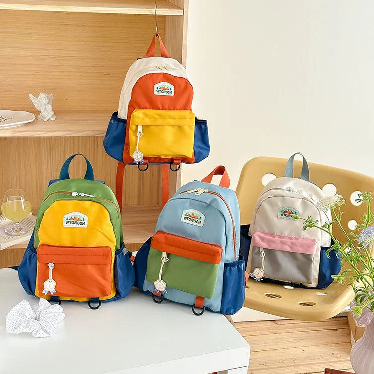 幼儿园儿童书包2025新款女童宝宝双肩包男孩小学生轻便撞色背包潮
