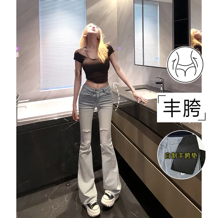 丰胯浅色破洞微喇叭牛仔裤女秋薄低腰设计感显瘦显身材提臀马蹄裤