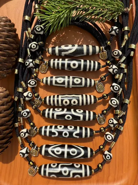 【老五珠宝】编绳黑白三六七八九眼天珠对孔57MM*13MM左右玛瑙多图