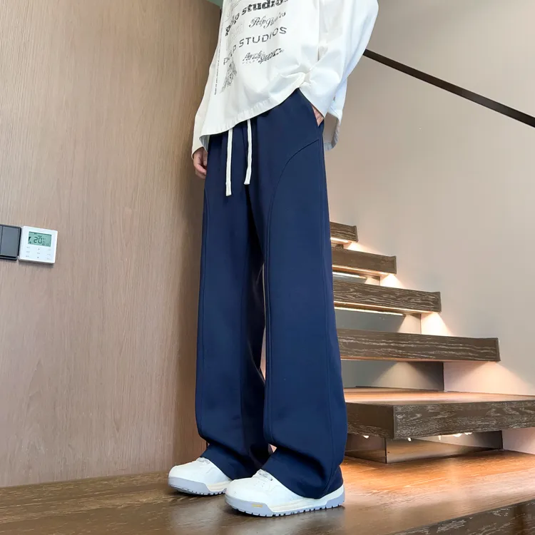 美式高街微喇弯刀卫裤男秋季斜切设计感阔腿裤垂感显瘦百搭休闲裤