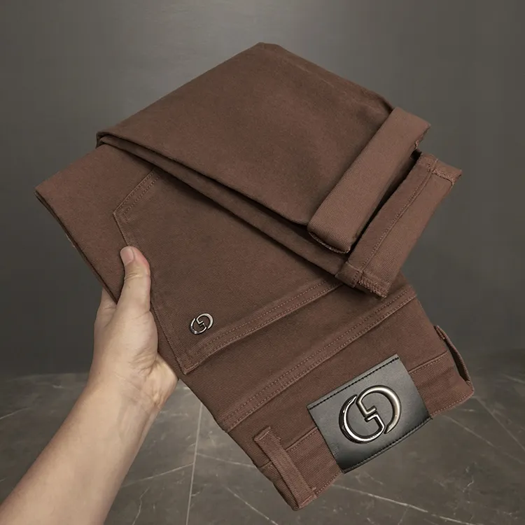 2025秋季新款咖色高端轻奢欧版修身弹力小脚裤牛仔裤百搭小直筒裤