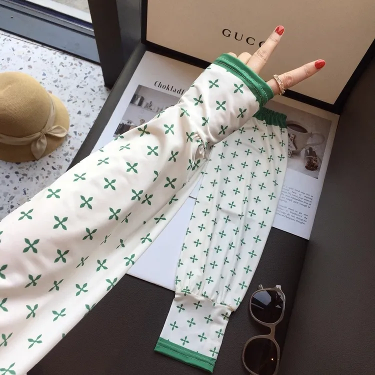 防晒袖套夏季宽松大码冰丝护臂手袖户外开车骑车防紫外线冰袖透气