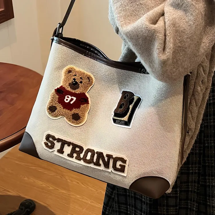 可爱卡通刺绣托特包大容量休闲单肩包通勤帆布包女百搭夏季时尚