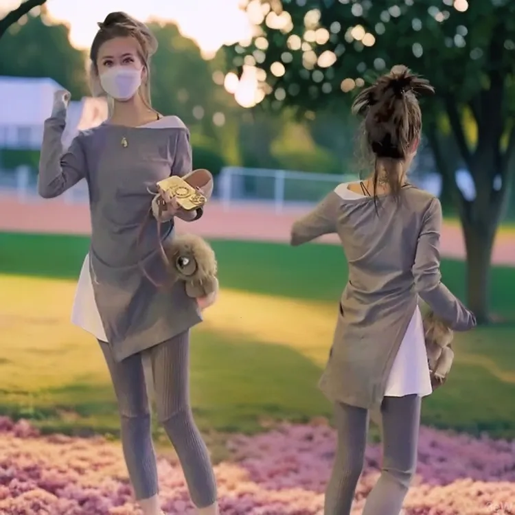 新年流行春节轻奢韩外穿2026欧时尚洋气中长款T恤显瘦上衣潮设计