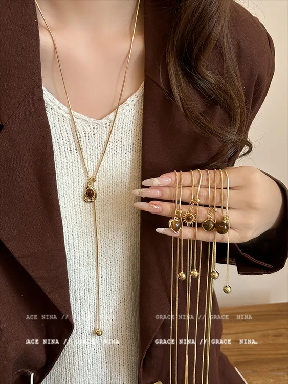 铜合金项链 复古美拉德虎眼石吊坠抽拉项链女百搭长款秋冬毛衣链