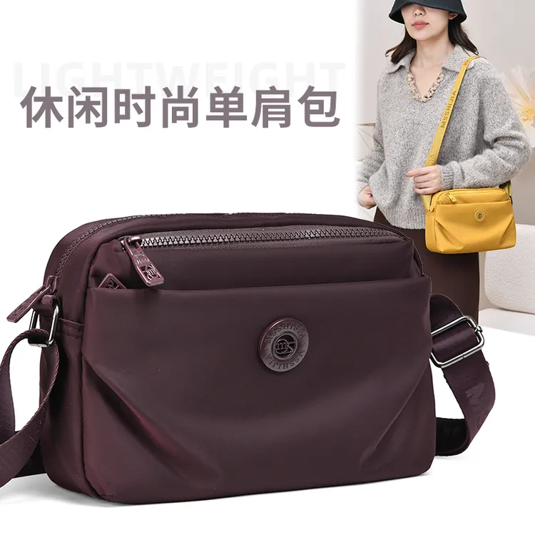 新款单肩斜挎包女士休闲百搭手机小包包轻便防泼水牛津布包妈咪包