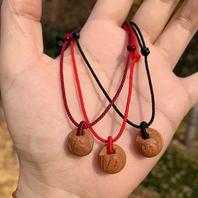 纯手工编织宝宝手链绳儿童压惊婴幼新生儿猪惊本命年女士红绳桃篮