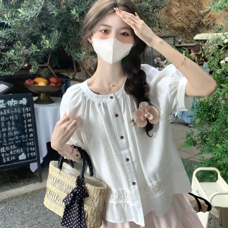 茶里茶气蕾丝拼接镂空衬衫装女夏季2025新款度假风设计感短袖上衣