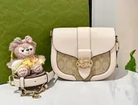 99新 COACH/蔻驰 蔻驰 白拼米色 马鞍包 99新/1676