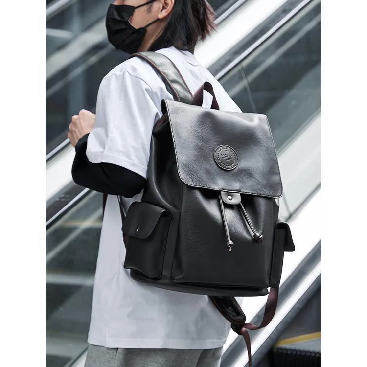 皮质双肩包潮流时尚休闲旅行男士电脑背包高中生大容量大学生书包