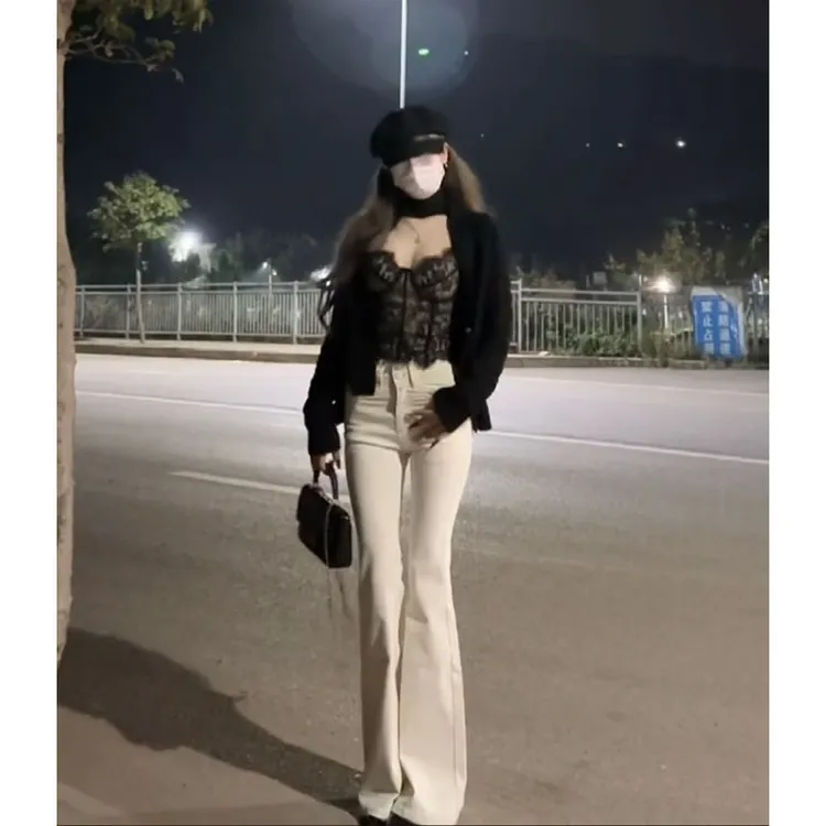 2025年春夏新款ins气质软糯针织开衫配蕾丝吊带高腰微喇牛仔裤女