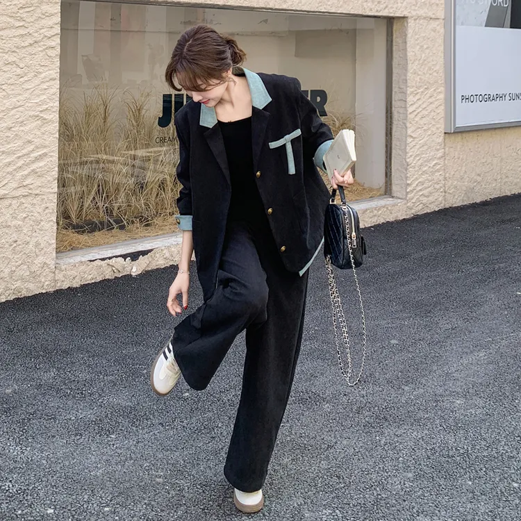 韩版设计感黑色西装套装女2025新款秋季牛仔拼接上衣阔腿裤两件套