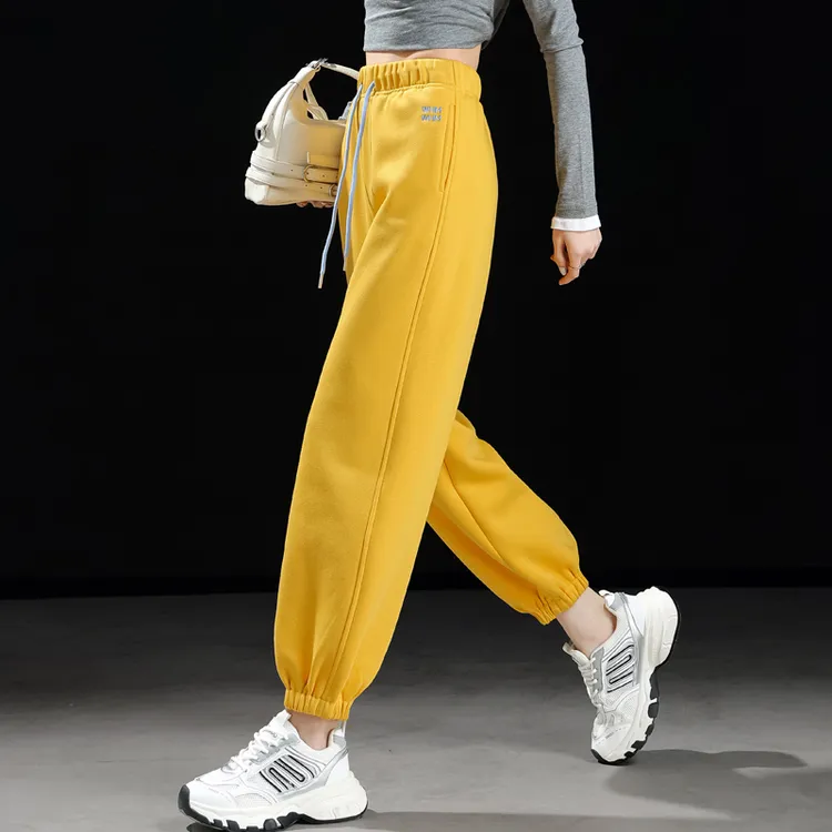 黄色束脚运动裤女2025新款秋冬卫裤松紧腰抽绳休闲裤女宽松哈伦裤
