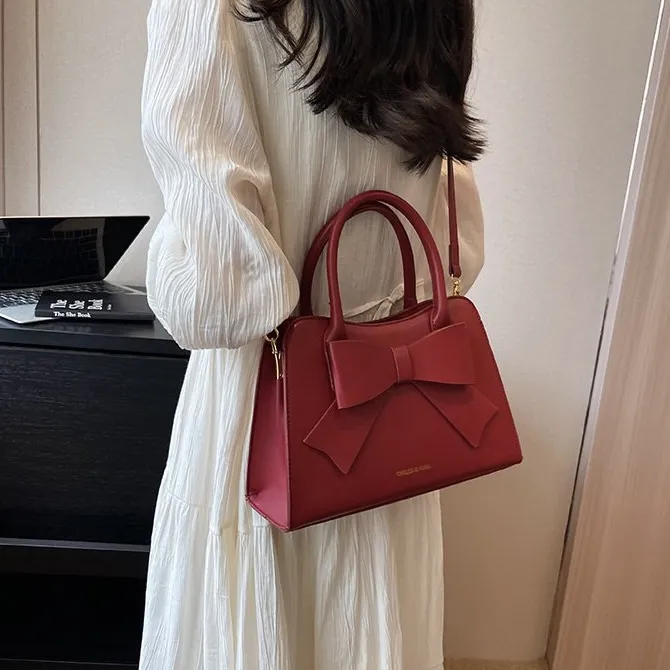 婚包高级感包包2025新款结婚手提包红色蝴蝶结新娘包大气斜挎包