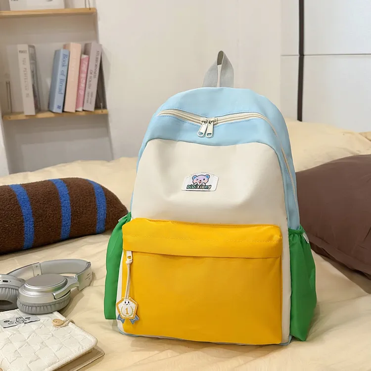 幼儿园小学生儿童书包2025新款男孩女童宝宝双肩包轻便撞色背包潮