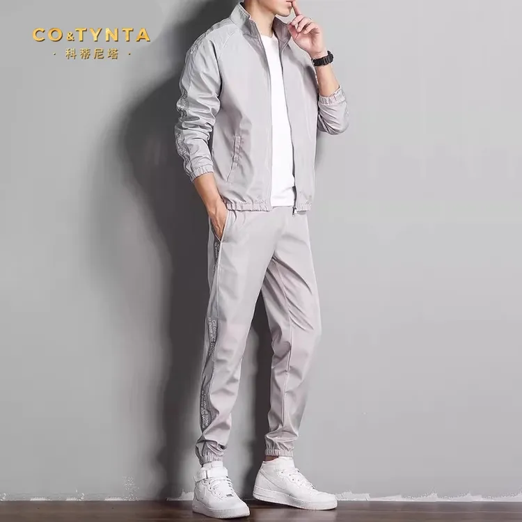 COTYNTA运动套装男士春秋新款潮流白色夹克衫搭配休闲卫裤两件套