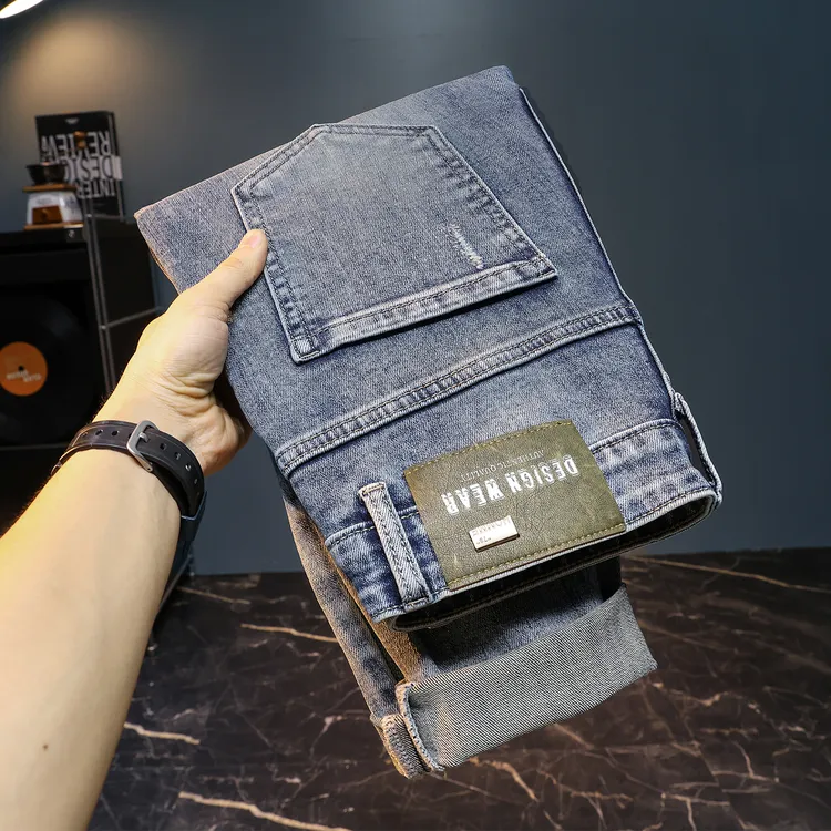 2025秋冬男士破洞牛仔裤浅色修身小脚裤潮流百搭弹力高端九分裤子